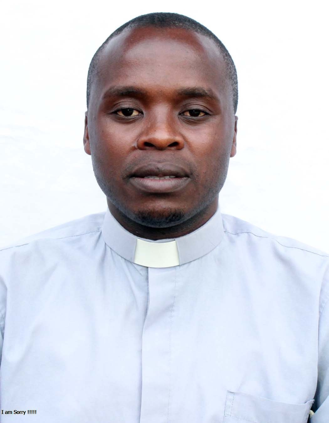 Fr. Collens Binomugisha