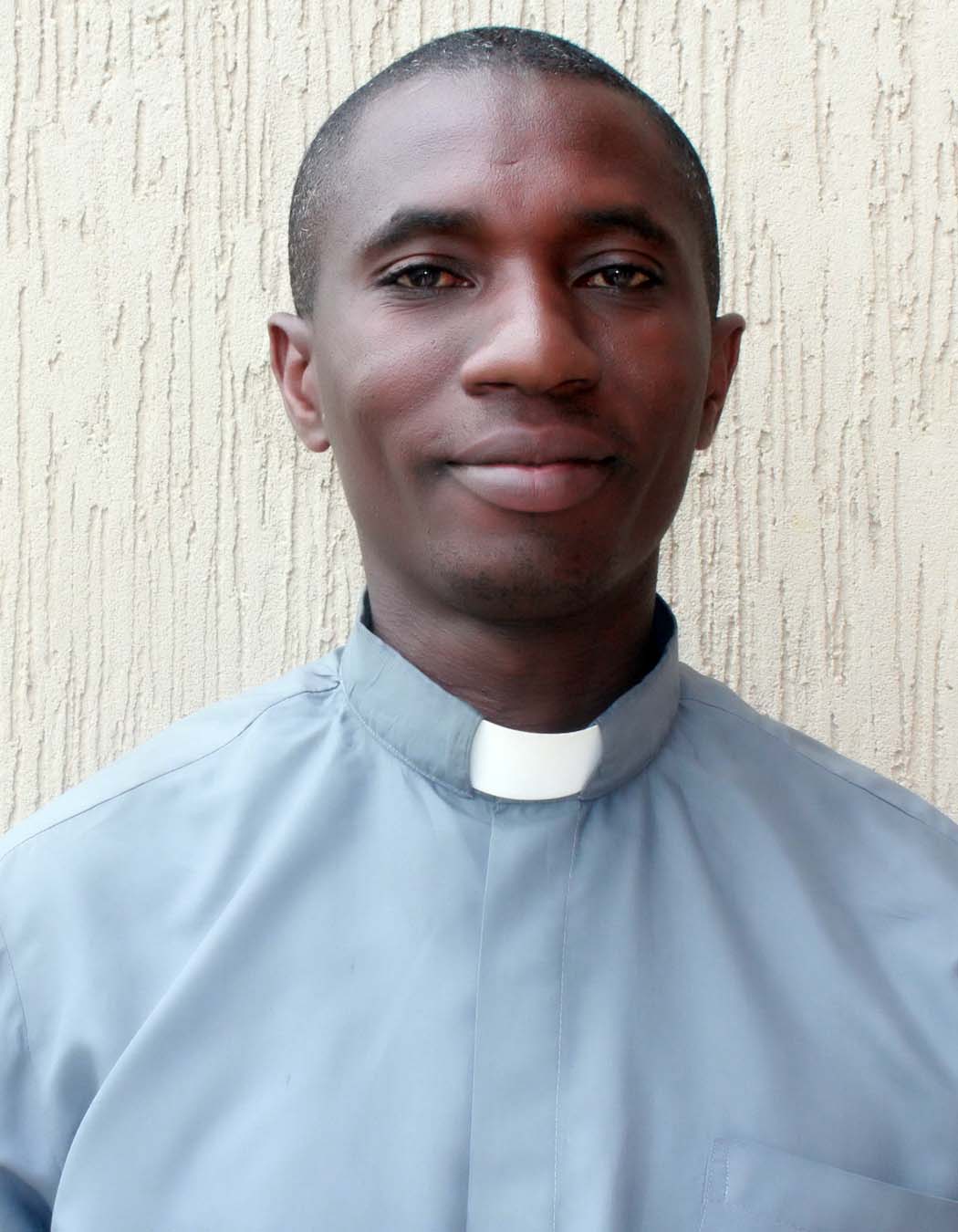 Fr. Conrad Nkamwesiga	